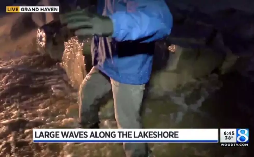 Video Of Weather Man Hit By Wave Live On TV In Grand Haven