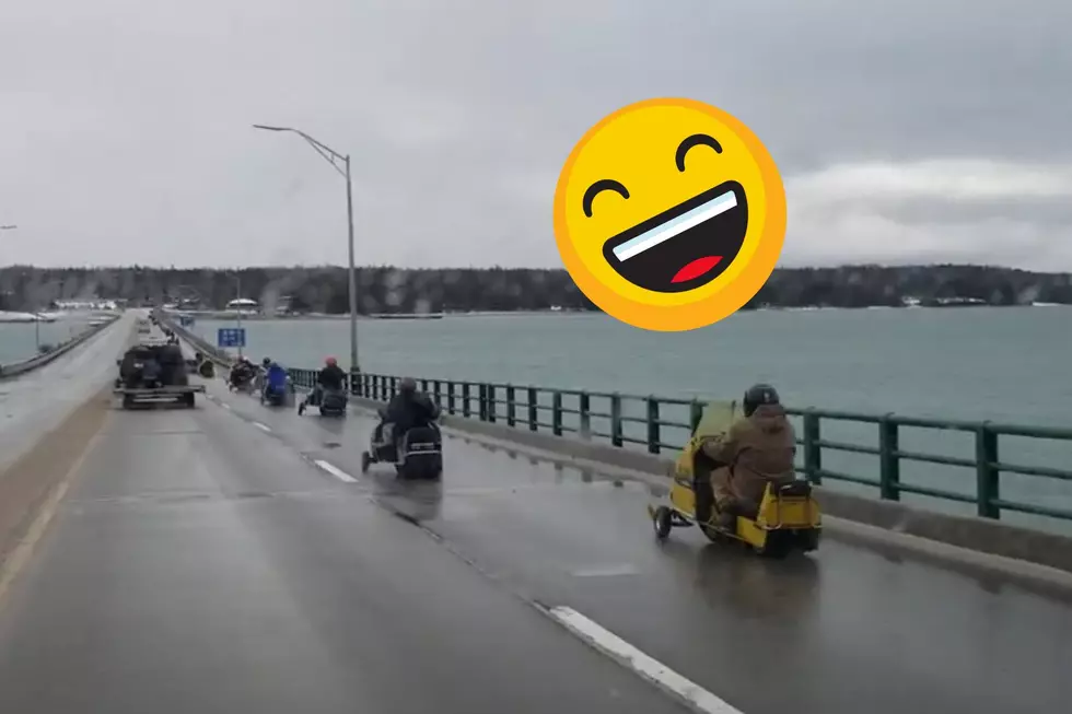 WATCH: Nearly 100 Antique Snowmobiles Cross the Mackinac Bridge