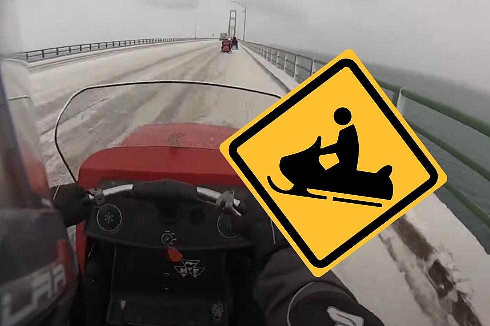 Watch Nearly 100 Antique Snowmobiles Cross the Mackinac Bridge