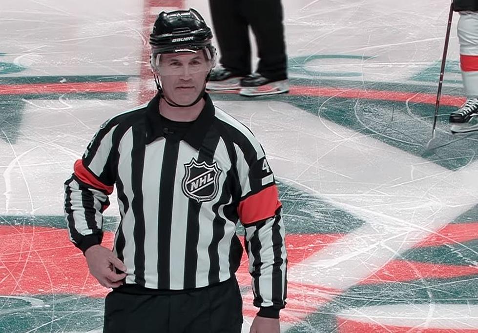 Referee Wes McCauley gets knocked down 