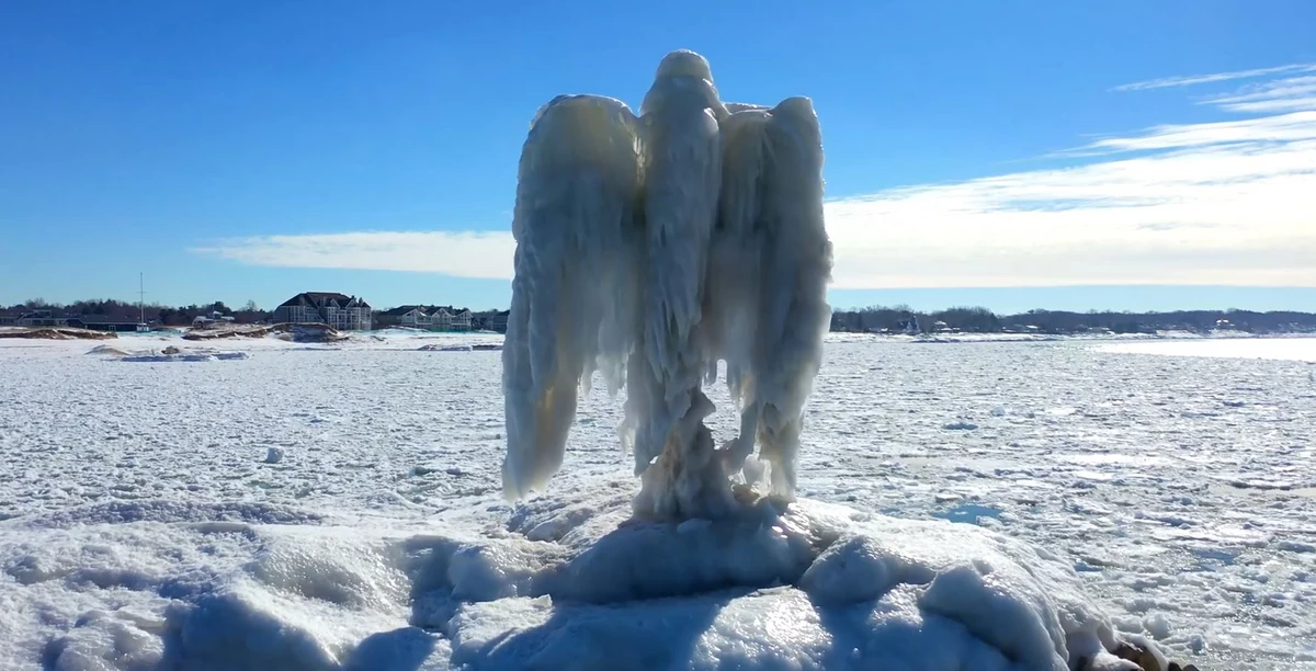 Download Ice Angel along New Buffalo Breakwater is Remarkably Breathtaking