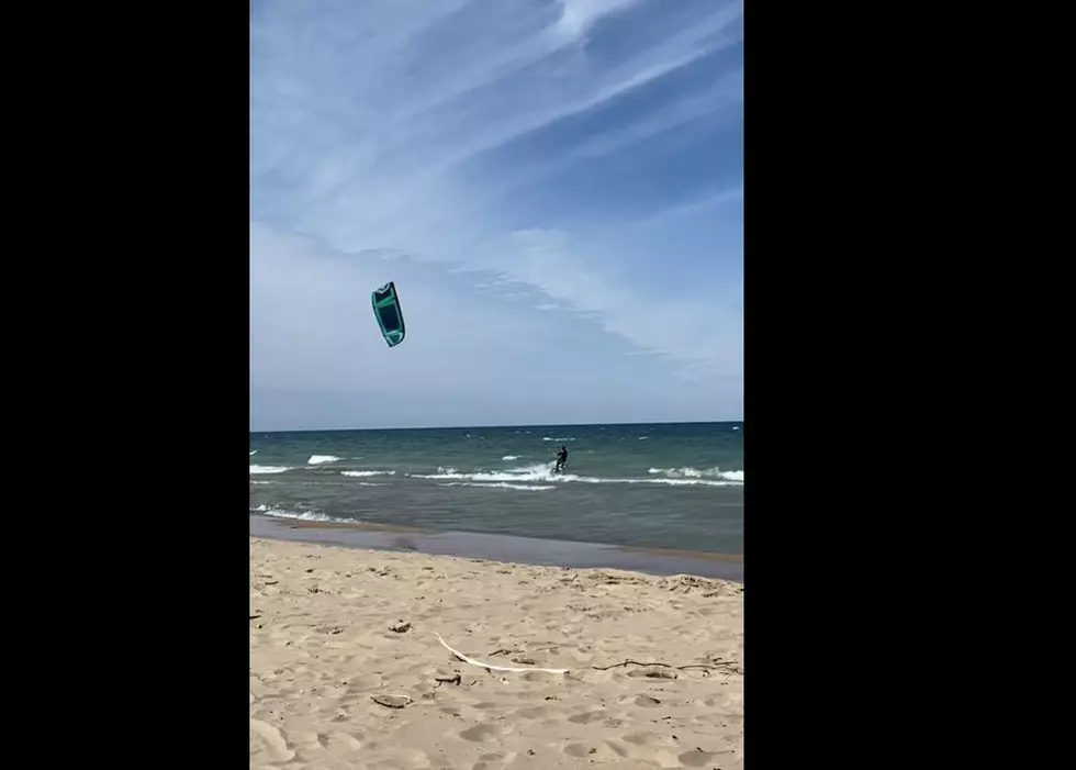 The First Kiteboarder of the Season Braves a Chilly Lake Michigan at Benton Harbor