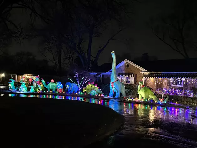 Livonia Family Decorating Their Yard With Christmas Dinosaurs