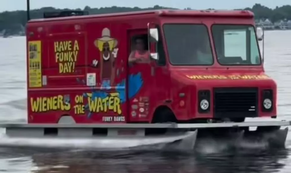 Floating Hot Dog Stand Serves Swimmers From A Pontoon Boat At Devils Lake