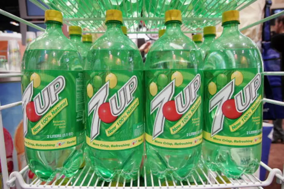 According To Urban Legend, What Does The Red Dot On The 7up Logo Stand For?