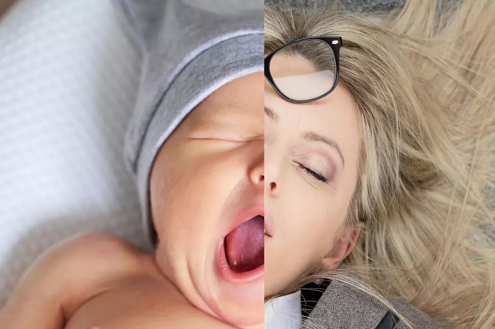 An exhausted mother and child are blended together.