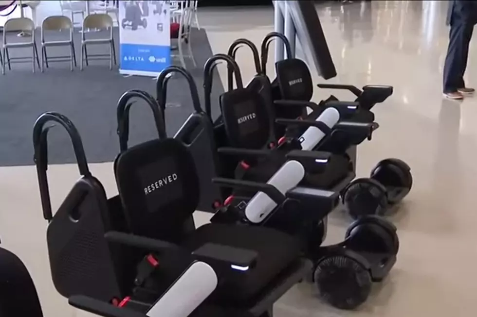A lineup of WHILL's autonomous wheelchairs in Detroit Metro's McNamara Terminal.