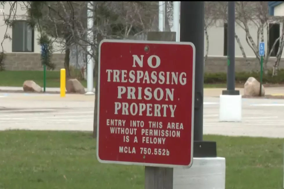 A warning sign outside of Baldwin, Michigan's North Lake Correctional Facility that reads: NO TRESPASSING PRISON PROPERTY ENTRY INTO THIS AREA WITHOUT PERMISSION IS A FELONY MCLA 750.552B