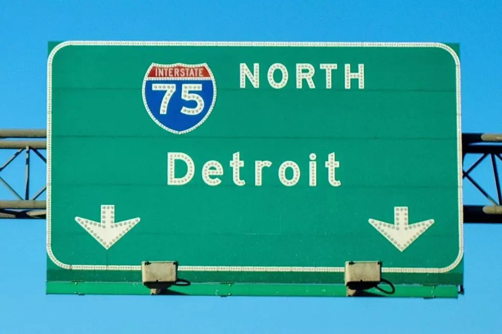 A sign for I-75 NORTH reading DETROIT