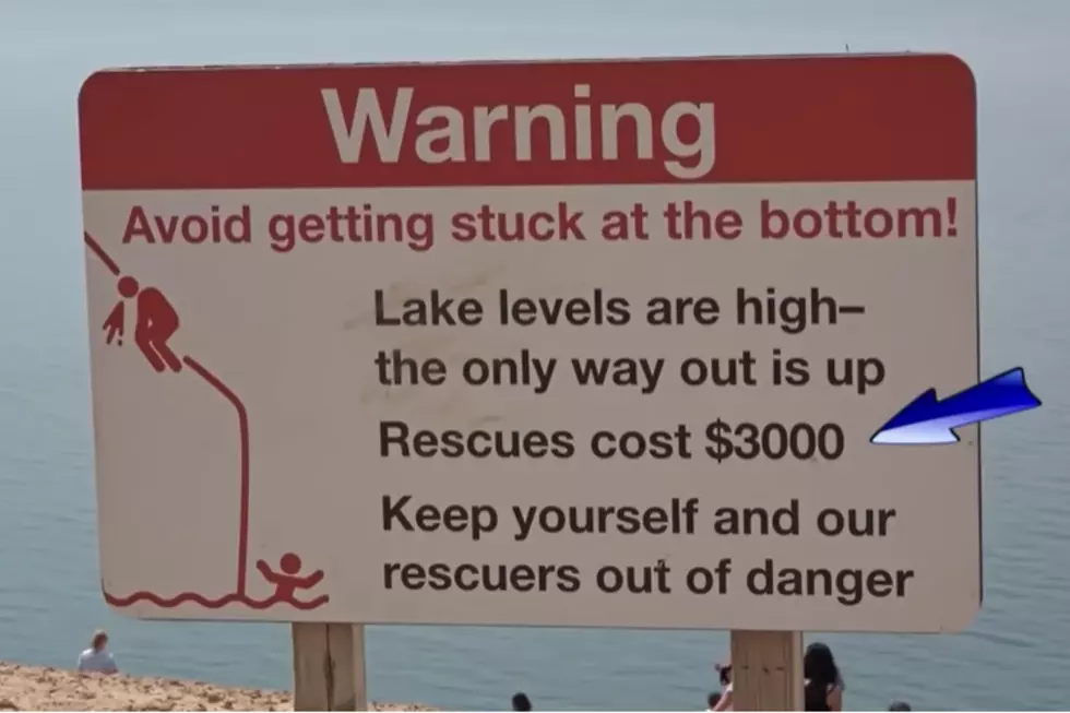 A look at one of the many warning signs posted on Sleeping Bear Dunes Outlook #9.