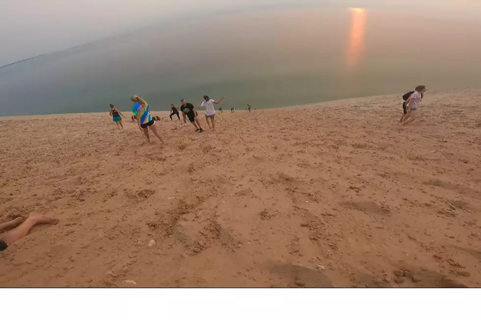 A look at visitors to Sleeping Bear Dunes drudging up the 450 foot incline.