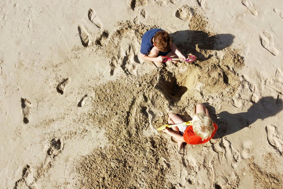 Boy Buried Alive at Michigan Beach, Saved by CPR