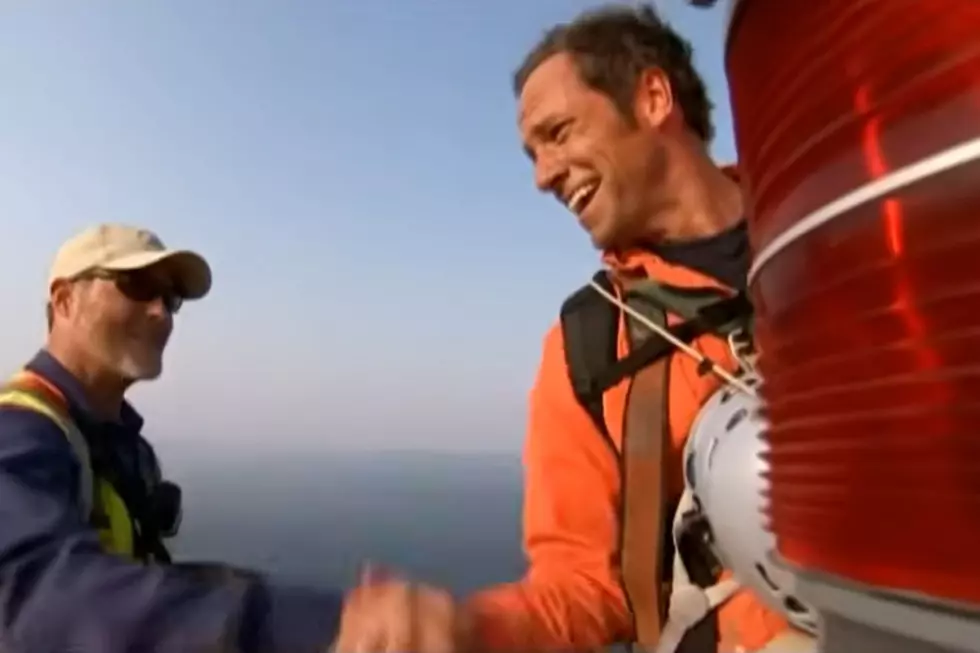 Mike Rowe stands atop the Mackinac Bridge in what he calls Dirty Jobs scariest moment.