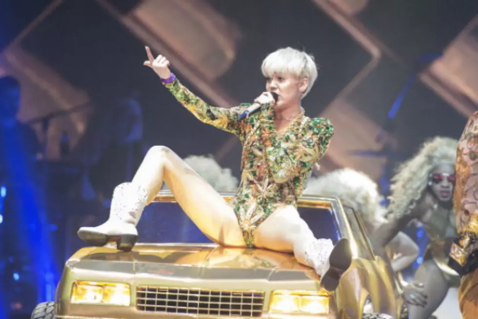 Watch Miley Cyrus Catch and Record a Cat Fight during her show in Detroit this Weekend