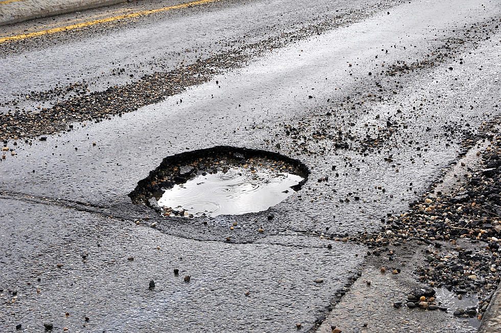 Potholes Prompt Delightful Payback From A Bath Township Prankster