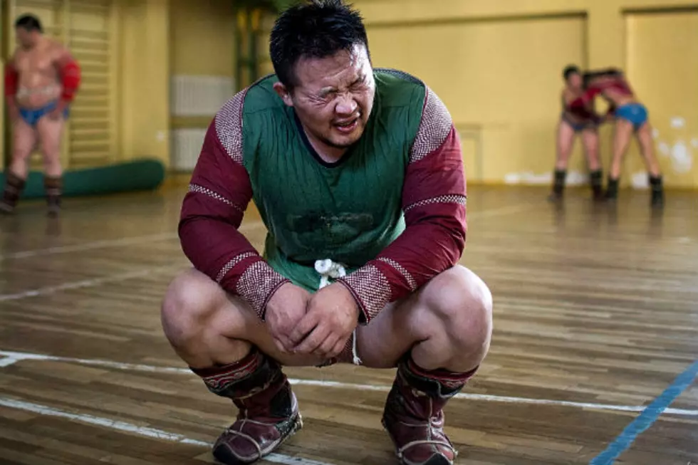 Mongolian Wrestling Coaches Strip in Protest at Olympics