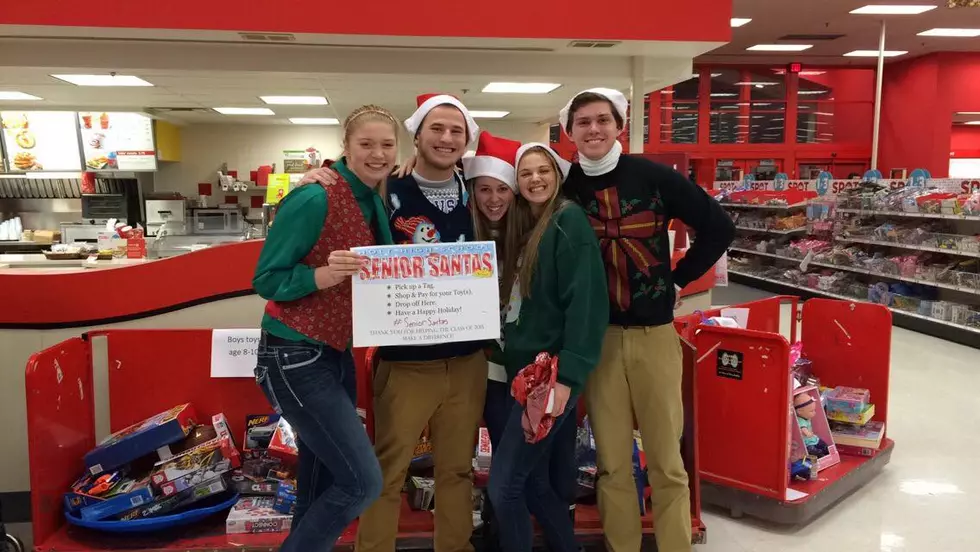 Holt HS Students Play Santa for Elementary Kids