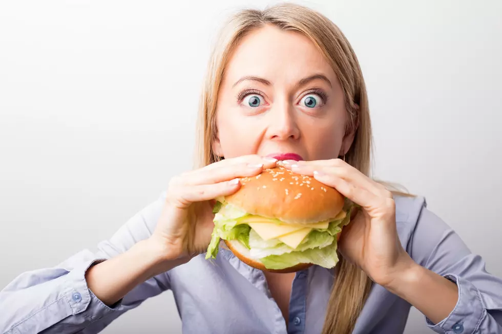 Woman eating burger