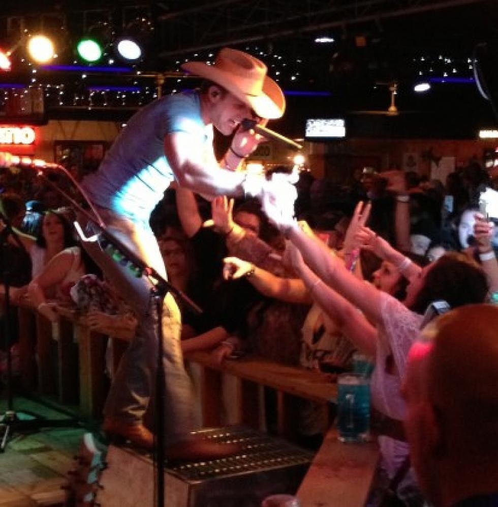 Dustin Lynch Hit With A Beer Can!