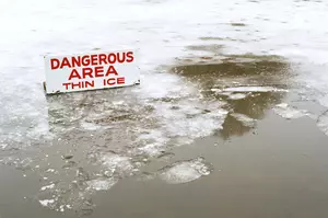Snowmobile Riders Fall Through Ice In Michigan Center