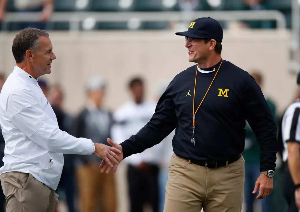 Dantonio and Harbaugh go at each other – on Twitter