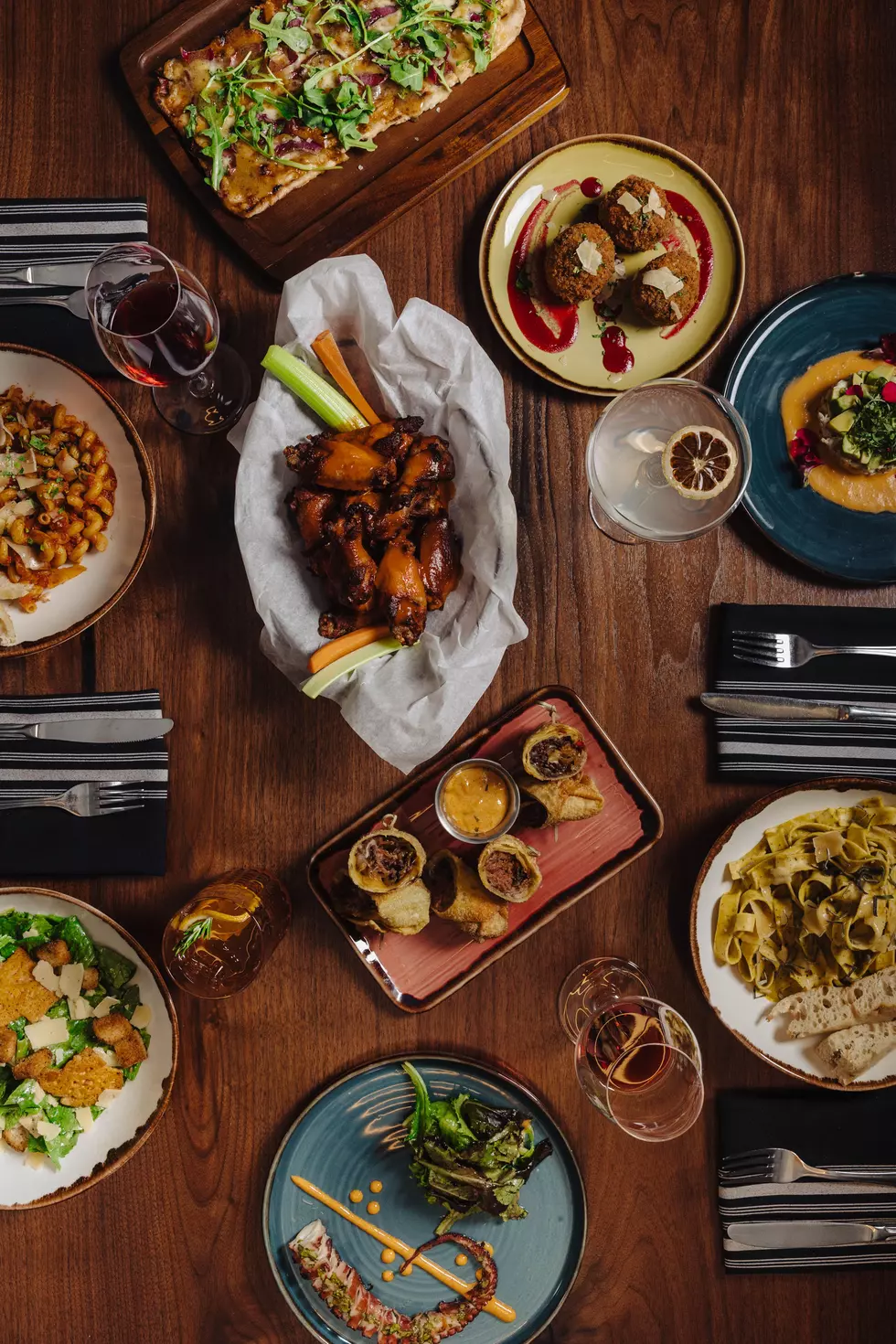 Above the table shot of food prepared and served at Kindred Table, the restaurant opening inside Crowne Plaza Lansing