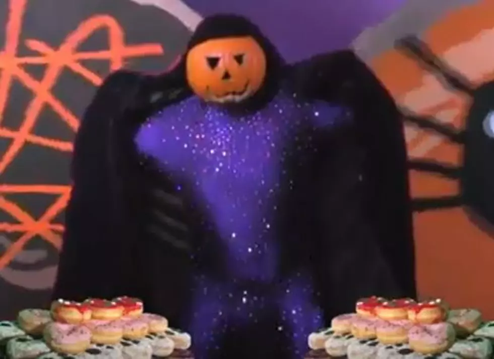 Dancing Pumpkin Man Celebrates Dunkin’s Halloween Donuts