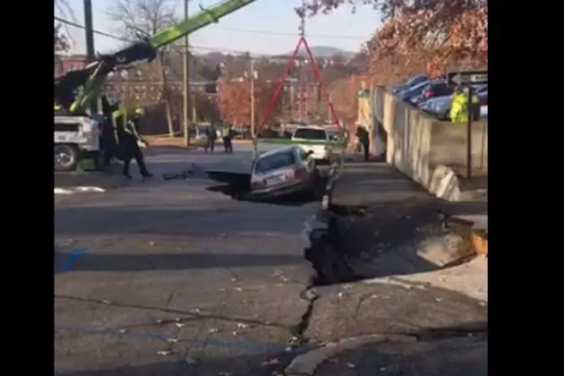 Car Falls Into Sinkhole In New Hampshire Road