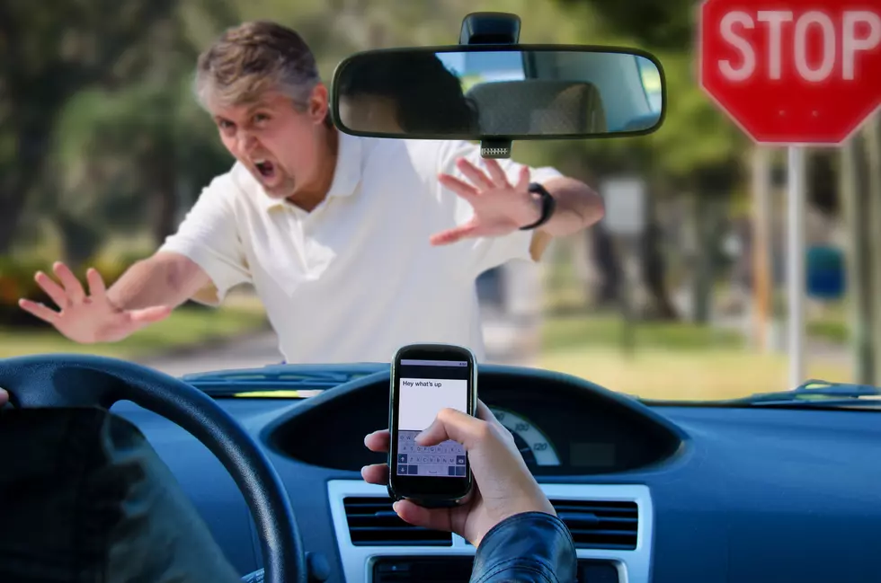 Should The Hands-Free Driving Law Apply In Parking Lots Too?