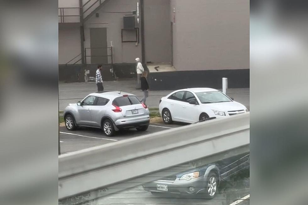 Are These Zombies, Aimlessly Wandering Behind a Building in Portland, Maine?