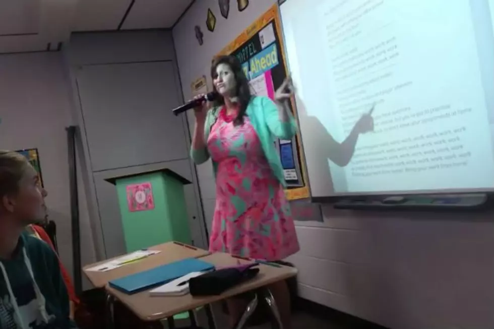 WATCH: Teacher Sings Her Own Version of Pop Songs During First Day of School Presentation