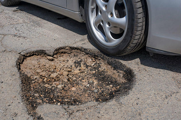 How to Report a Giant Pothole in Your City/Town