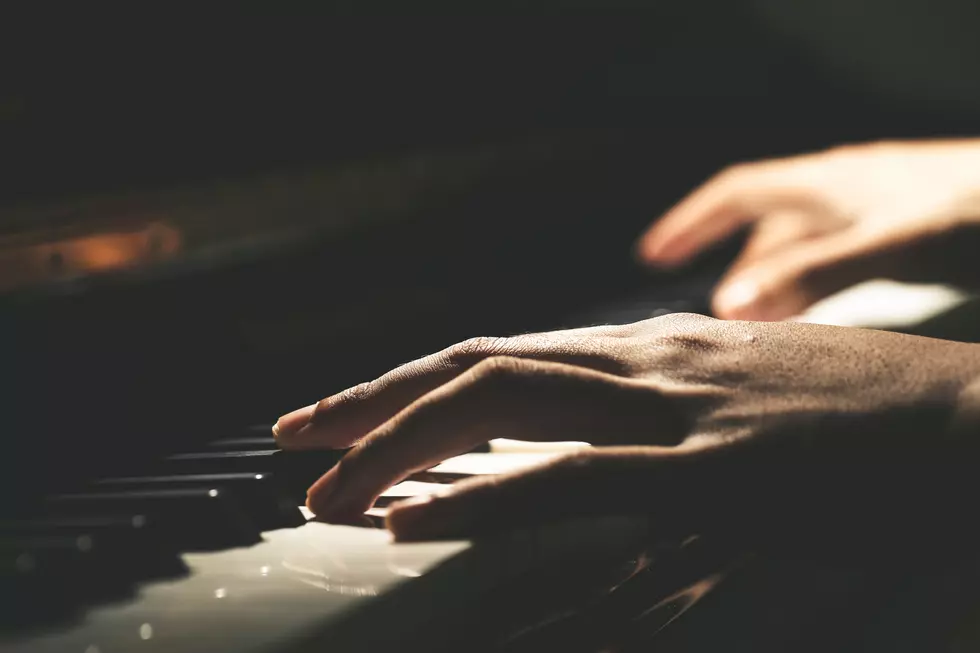 Watch Four Hands Play One Piano