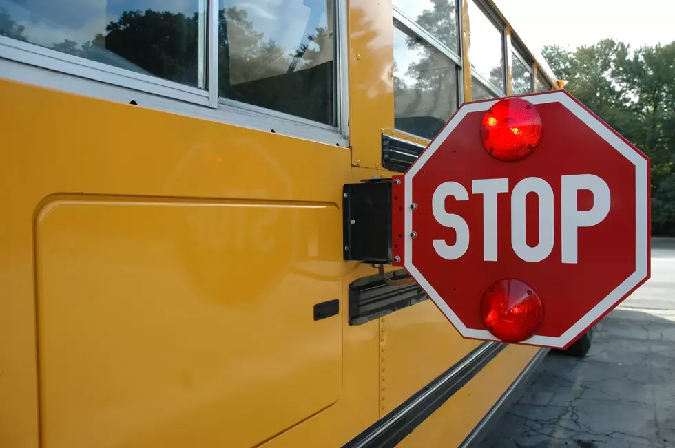 Must You Stop for a School Bus on a Multi-Lane Road in Maine?