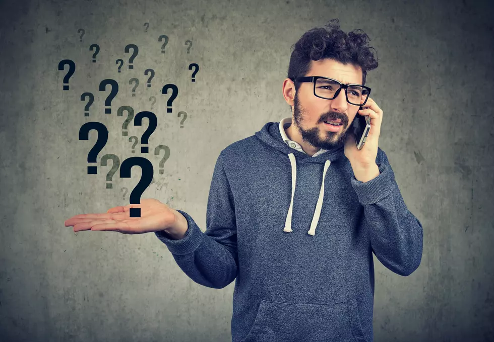 Confused man having phone call