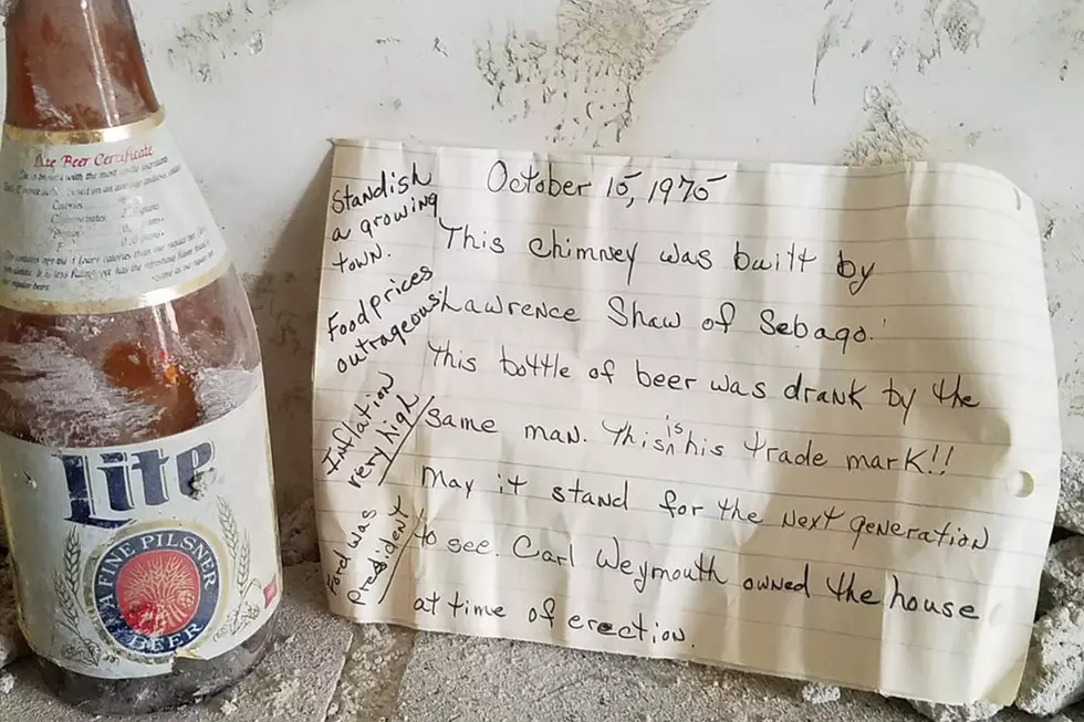 Standish Couple Finds Old Beer Bottle and Note In Their Wall