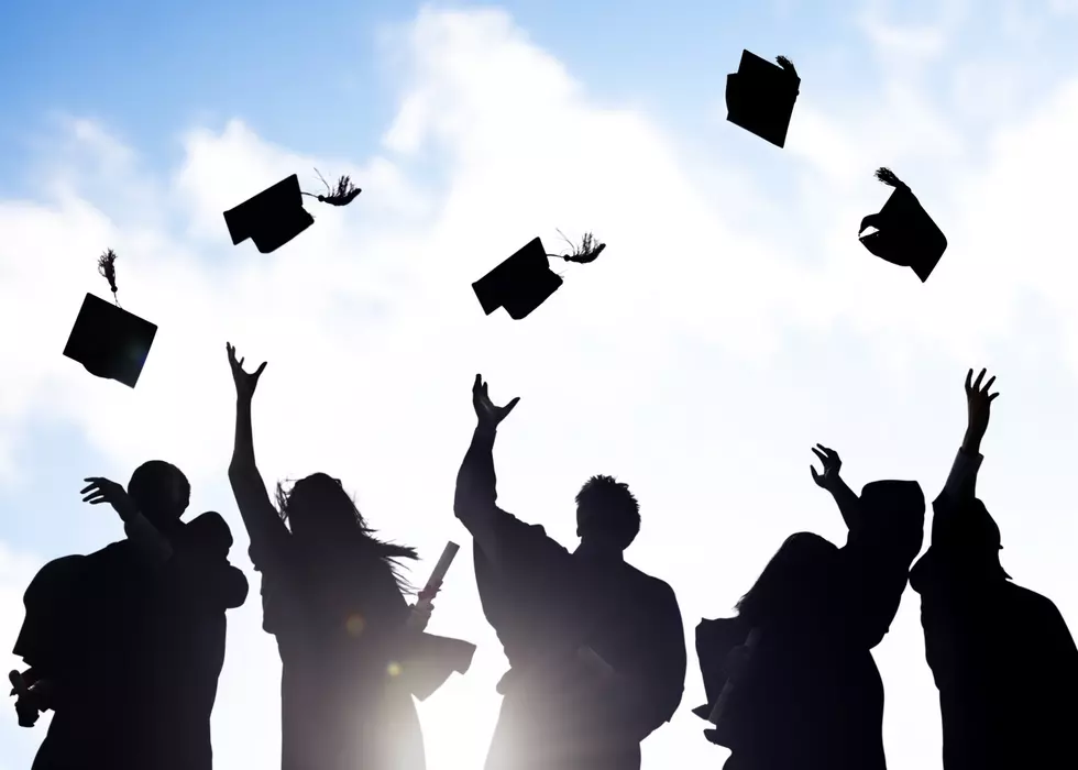 Silhouettes of Diverse International Students Celebrating Graduation