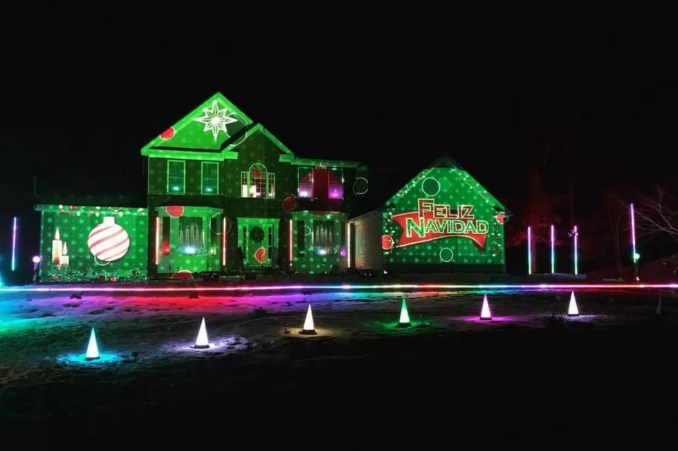 NH Light Show Has Massive Projection That Plays Holiday Videos