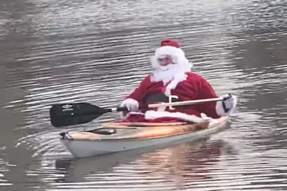Watch Santa Kayak on a Flooded Maine Baseball Field the Day After Christmas