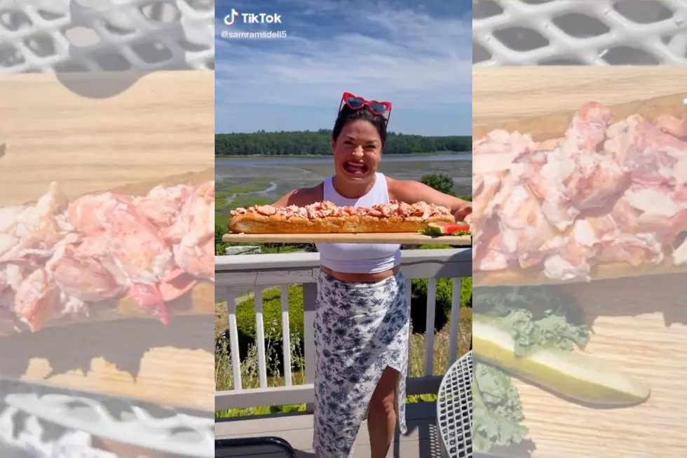 The World’s Largest Mouth Takes on the World’s Largest Maine Lobster Roll