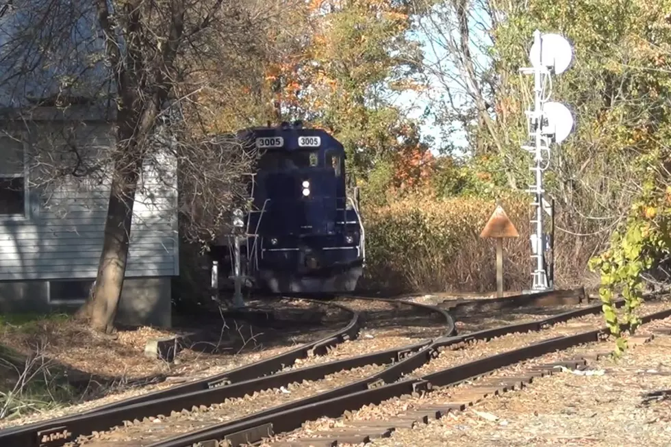 Watch This Train Rumble by a Maine Home Just Feet Away