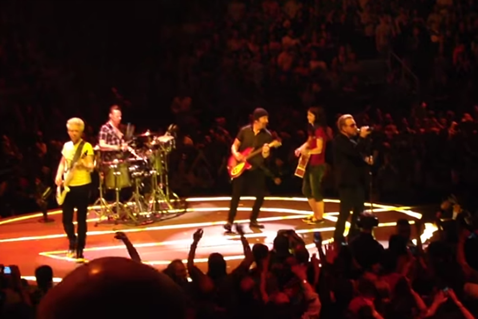 Watch: Young Fan Plays Guitar with U2!