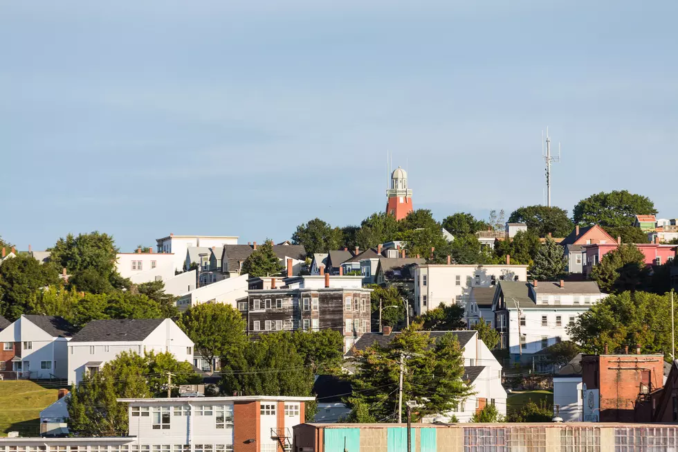 A view of buildings on hills in Portland, Maine from the sea