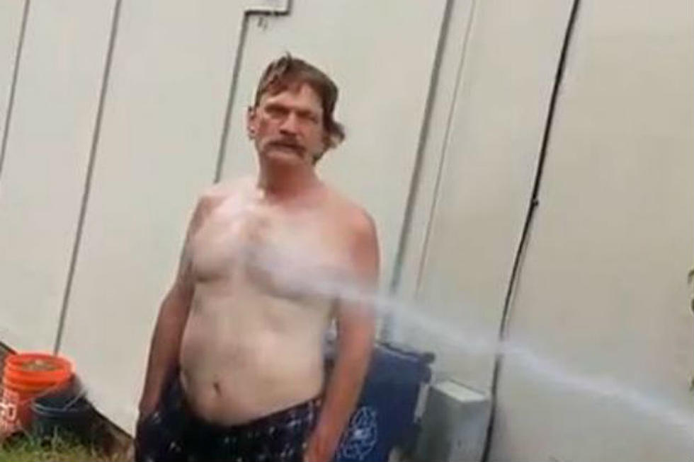 Drunk Man Getting Hosed By Neighbor Isn’t Phased [NSFW VIDEO]