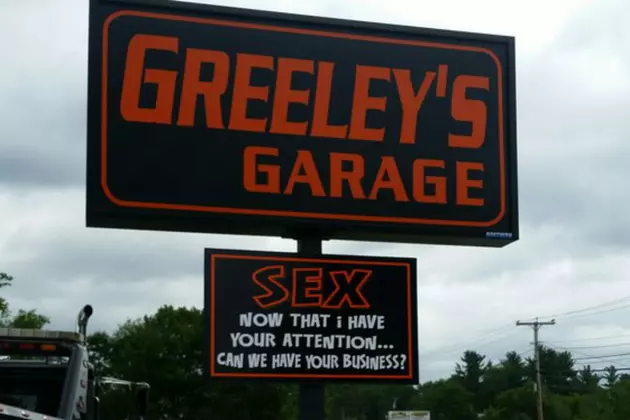 A Garage In Auburn Has One Incredible Attention-Grabbing Sign