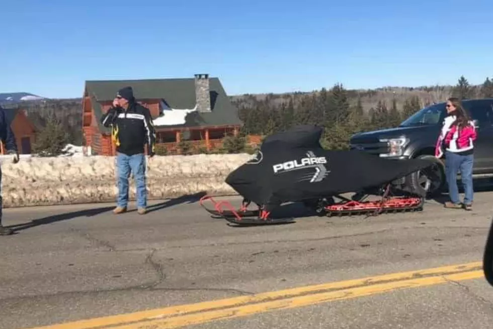 Someone Just Left Their Snowmobile Sitting On Route 4 In Maine