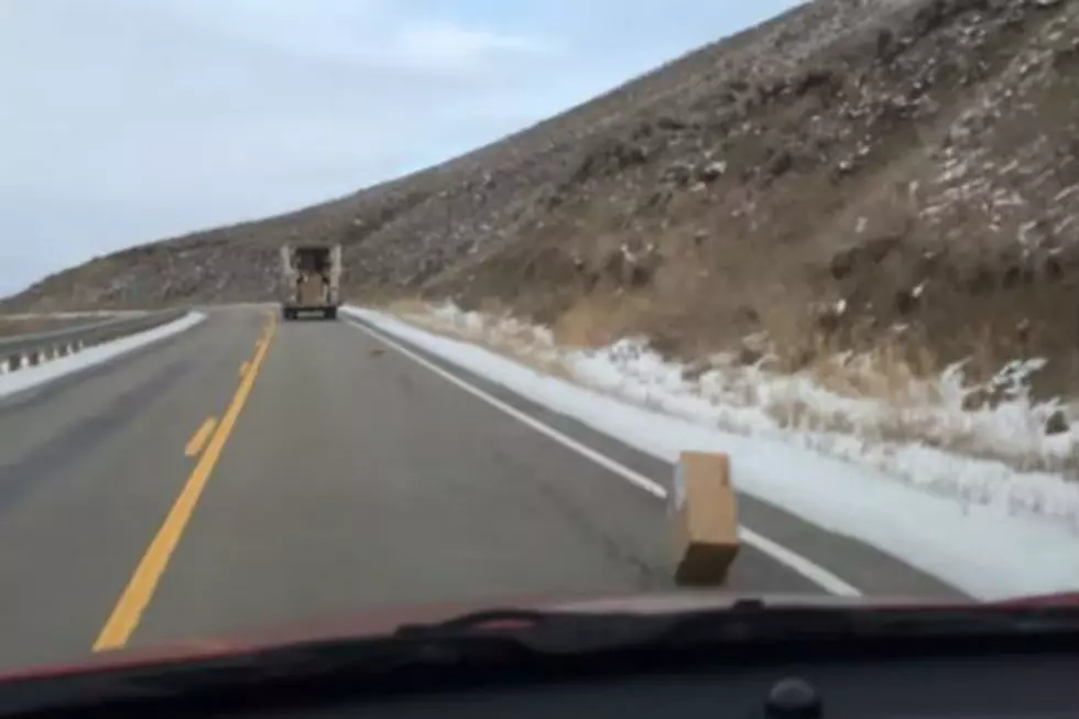 Watch Packages Falling Off Delivery Truck [VIDEO]