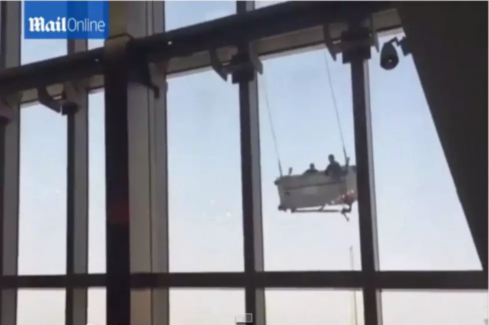 Window Washers Swinging Wildly In The Wind [VIDEO]