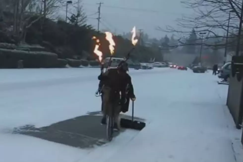 Stupid News Spotlight: Flame Throwing Bagpipist Shovels Snow on Unicycle