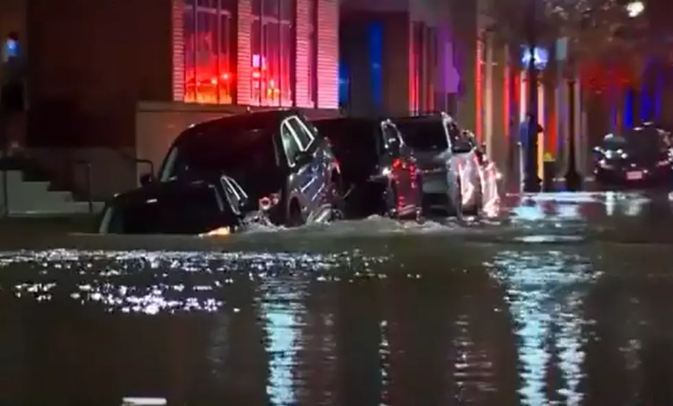 Huge Boston Water Main Break Causes Street Flood and Car To Fall In Sink Hole
